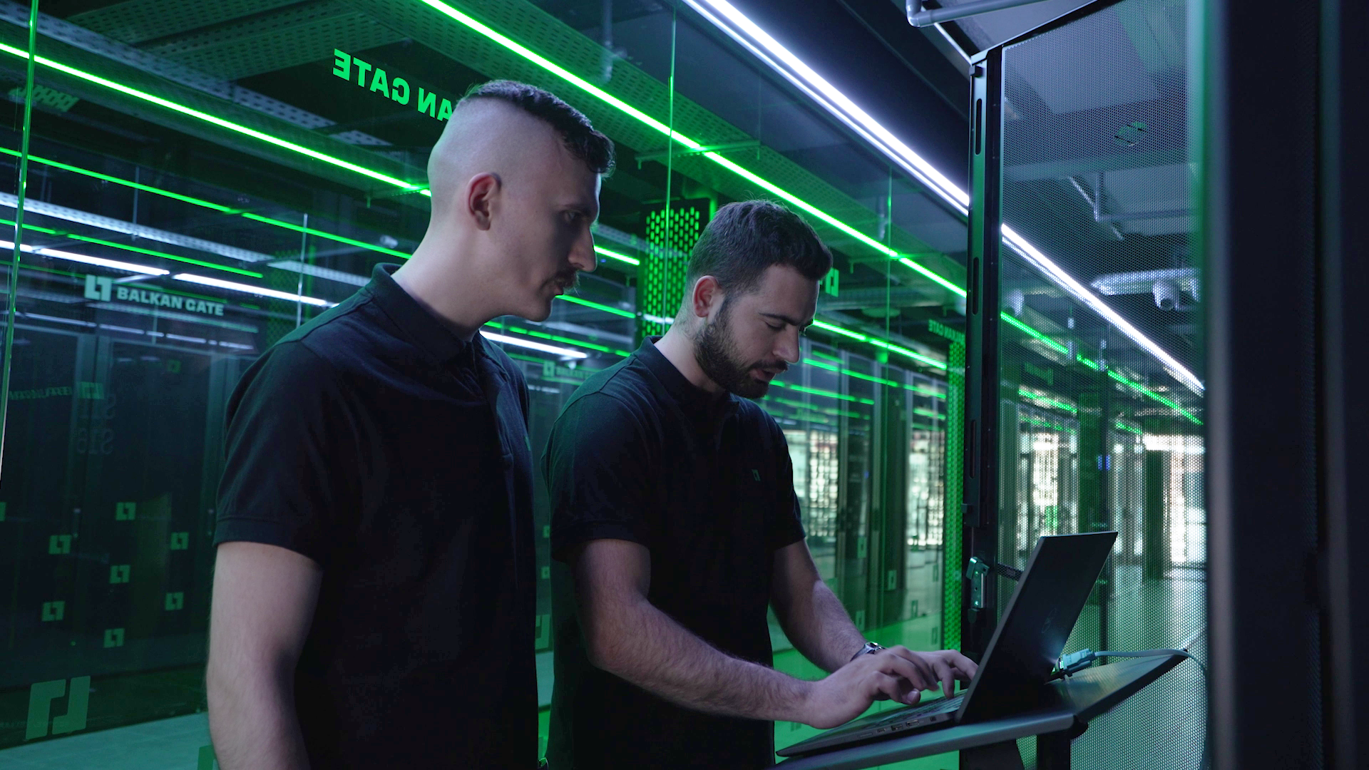 Engineers inspecting server racks inside Lancom's data center - Balkan Gate.