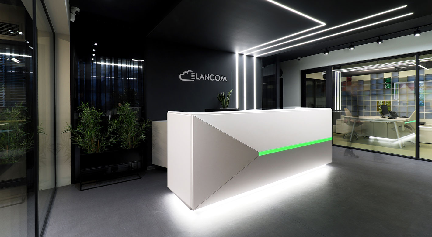 Lancom's reception area with modern lighting and minimalist design.