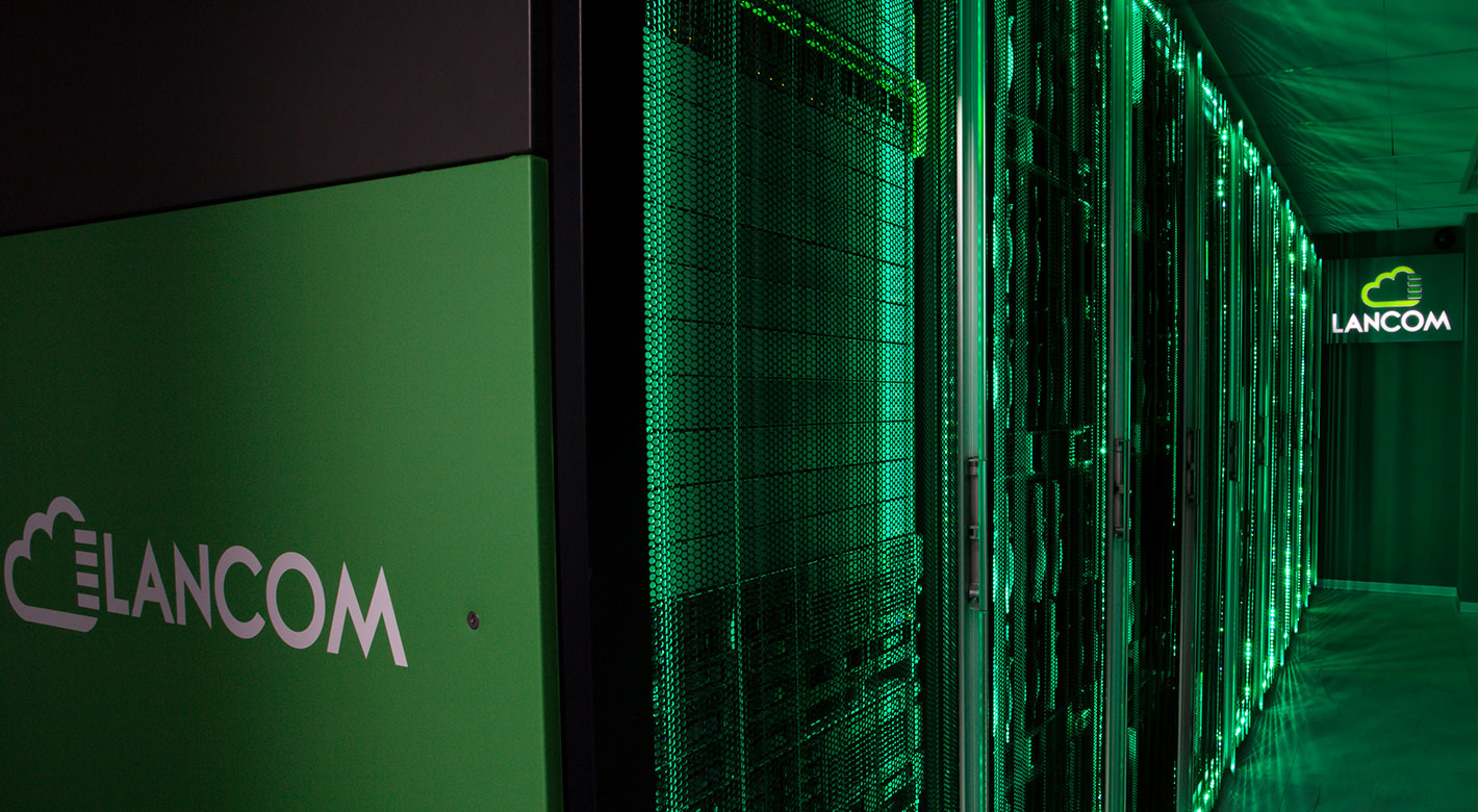 Lancom Data Center interior with illuminated server racks and green network lighting.